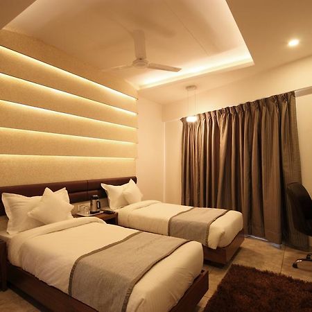 Hotel Bait Inn Ahmadábád Pokoj fotografie