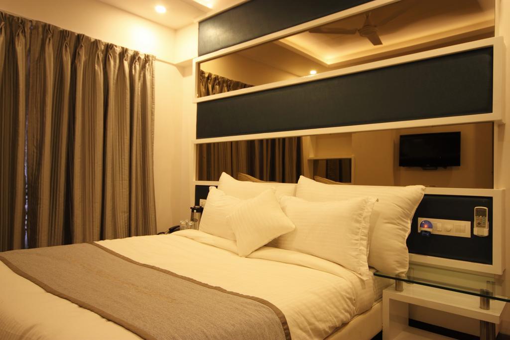 Hotel Bait Inn Ahmadábád Pokoj fotografie
